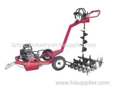 Towable 9hp mini post hole digger