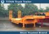 Economic 2 axles 30 tons semi Low Bed Trailer with heavdy duty steel spring ramps