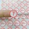 Minrui wholesale small red round destructible warranty self adhesive label.Tiny tamper evident proof seal labels.
