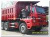 Sinotruk howo heavy duty loading mining dump truck for big rocks in wet mining road