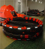 Both Sides of a Canopied Reversible Inflatable Life Raft