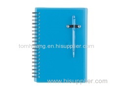 Spiral bound notebook with ballpoint pen