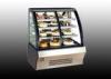 Refrigerated cake display freezer with heating wire to avoid fog