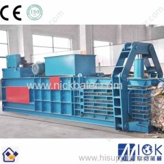 Newspaper recycling strapping machine