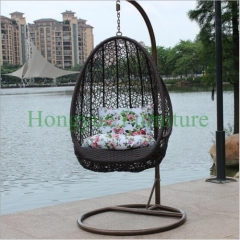 Brown wicker material hammock with cushions rattan hanging chair