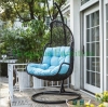 Black rattan wicker hammock with blue cushions