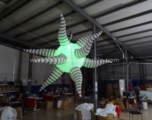 Color changing inflatable star light for event decorations