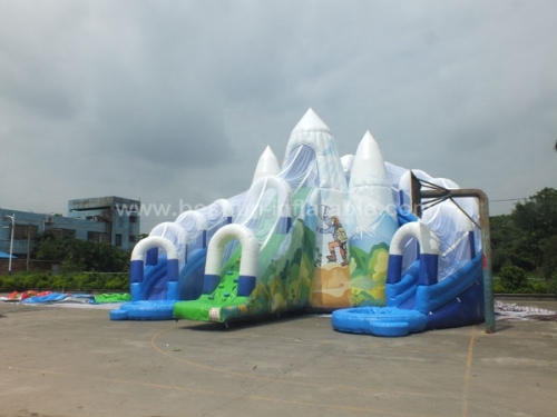 Giant double water slide with mountain climbing