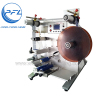 Round bottle two-sided labeling machine