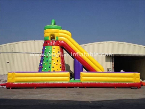 Rock climbing wall and slide inflatable sports games