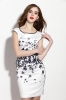 Round neck sleveless patched and printed sheath dress