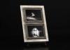 Two 5x7 Openings Tabletop Photo Frames In Antique White and Black With One Wooden Shelf