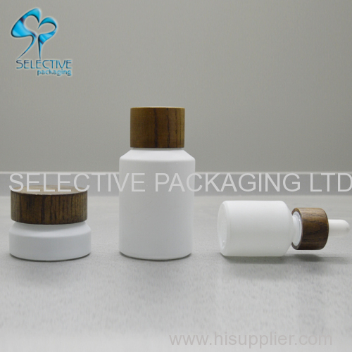 white coating inclined shoulder glass cosmetic packaging lotion bottle and cream jar series with ash wood screw lids