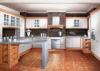 U Shaped Thermofoil Kitchen Cabinets With Stainless Steel Appliances And Dishwasher