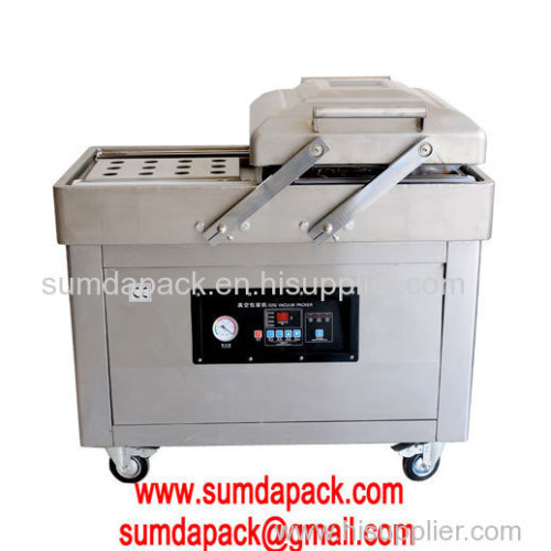 Double chamber vacuum sealing machine