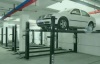 Simple four-post hydraulic car lifter