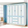 Bright colour wood wardrobe and chest in same color with other furniture in home