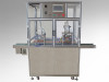 Automatic cuvettes filling and sealing machine