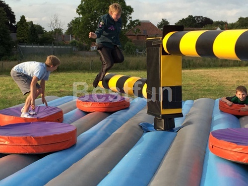 Wipeout obstacle inflatable sweeper game