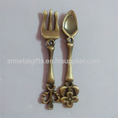 Metal crafted souvenir spoon and fork set