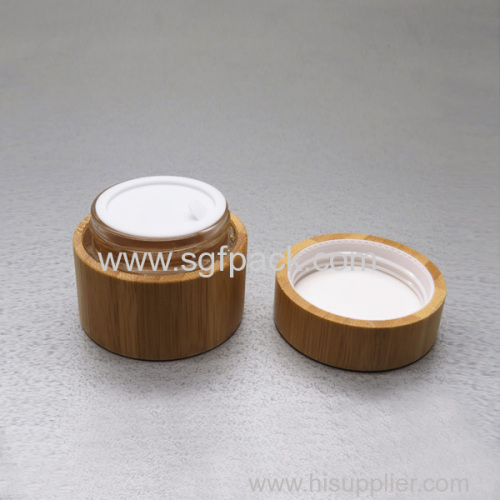 Glass cream jar wooden jar