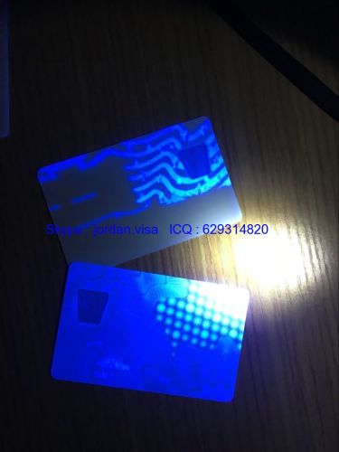 New York ID card with UV light