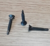 Self drilling screw - flat head with 4 ribs - cross phillip drive - phosphated