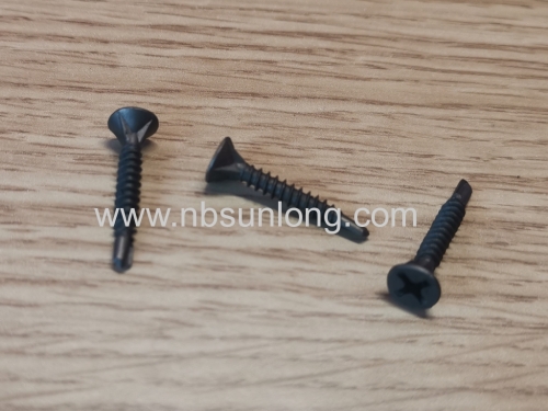 Self drilling screw - flat head with 4 ribs - cross phillip drive - phosphated