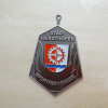 Antique silver community event medal