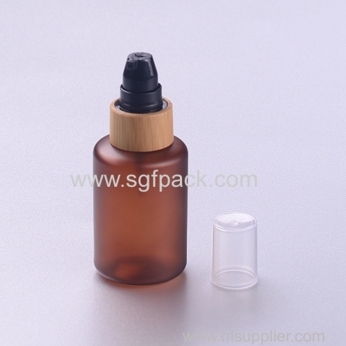 Bamboo lotion cosmetic packaging 60ml 120ml 250ml 500ml frosted amber boston round plastic PET bottle