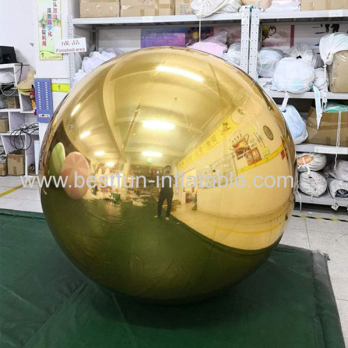 large inflatable ball with mirrored or reflective surfaces typically used for parties and dance events