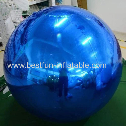 large inflatable ball with mirrored or reflective surfaces typically used for parties and dance events