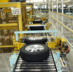 Tire conveying and caging line
