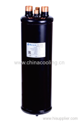 Suction line accumulator with internal heat exchange coil