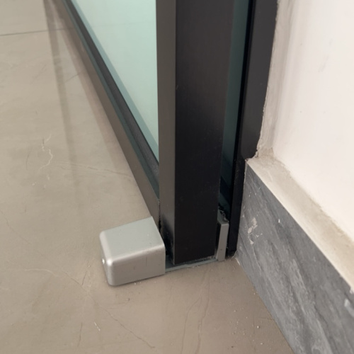 automatic door floor guide for framed doors